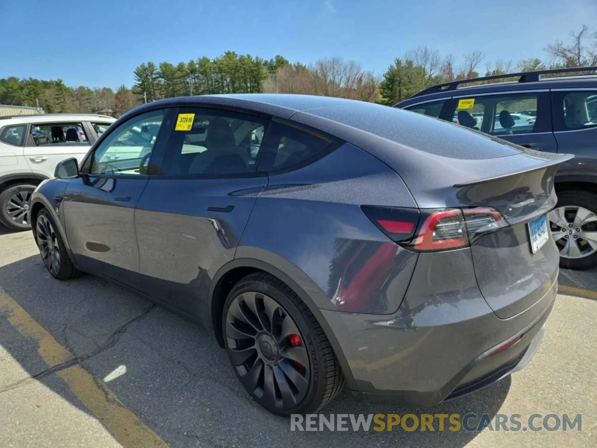 12 Photograph of a damaged car 7SAYGDEF9PF700567 TESLA MODEL Y 2023