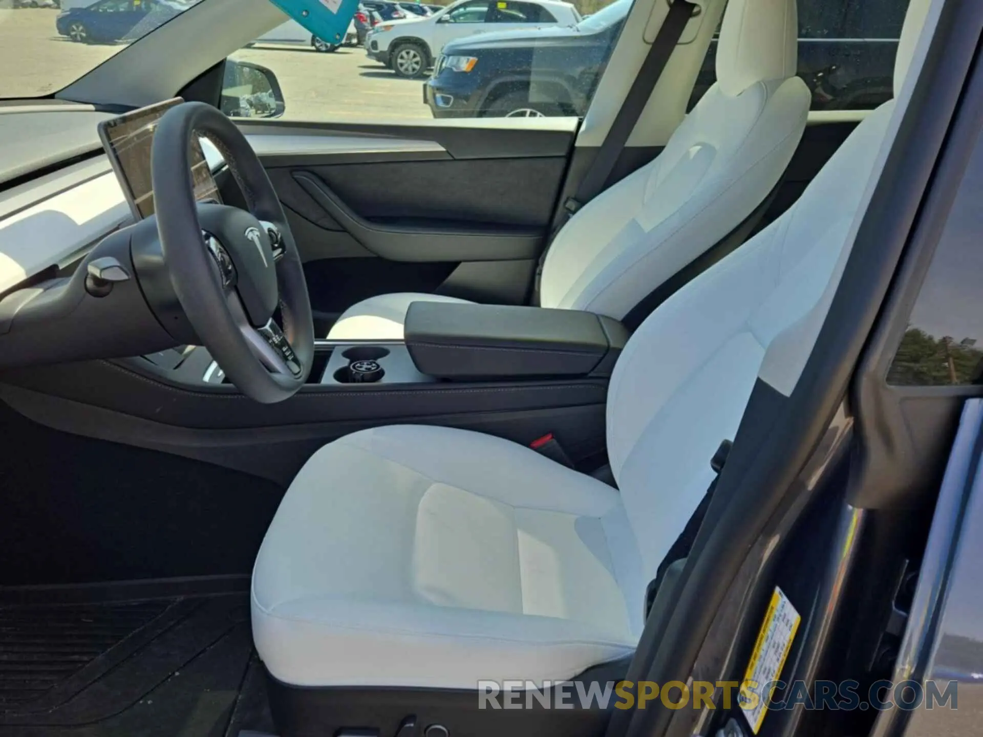4 Photograph of a damaged car 7SAYGDEF9PF700567 TESLA MODEL Y 2023