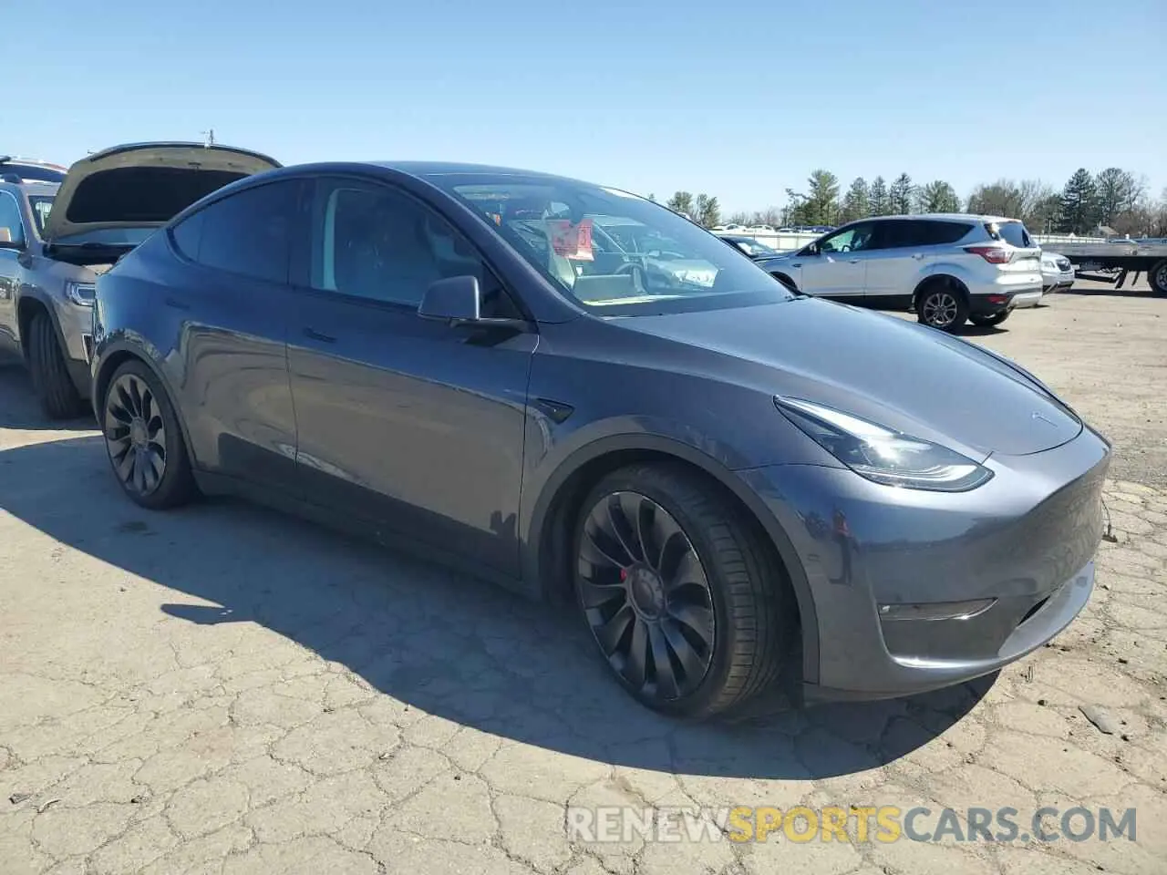4 Photograph of a damaged car 7SAYGDEF9PF865129 TESLA MODEL Y 2023