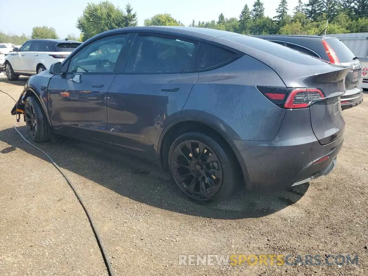 2 Photograph of a damaged car LRWYGDEE0PC162050 TESLA MODEL Y 2023