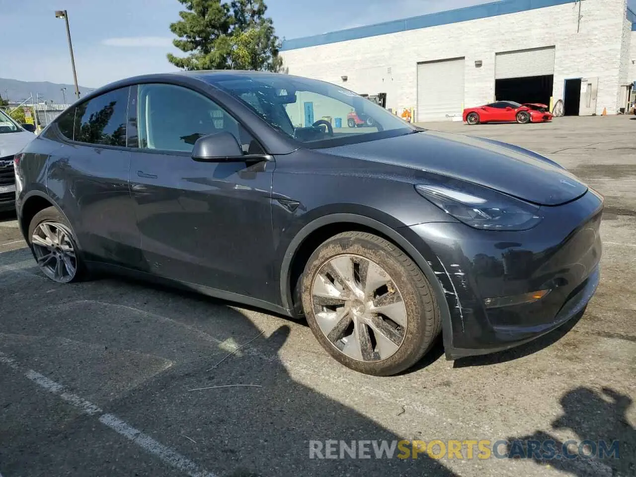 4 Photograph of a damaged car 7SAYGAEE0RF021084 TESLA MODEL Y 2024