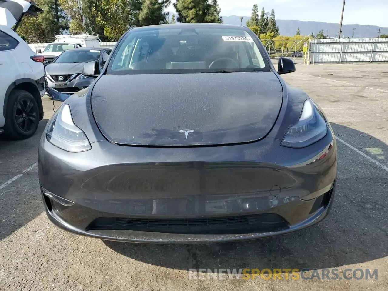 5 Photograph of a damaged car 7SAYGAEE0RF021084 TESLA MODEL Y 2024