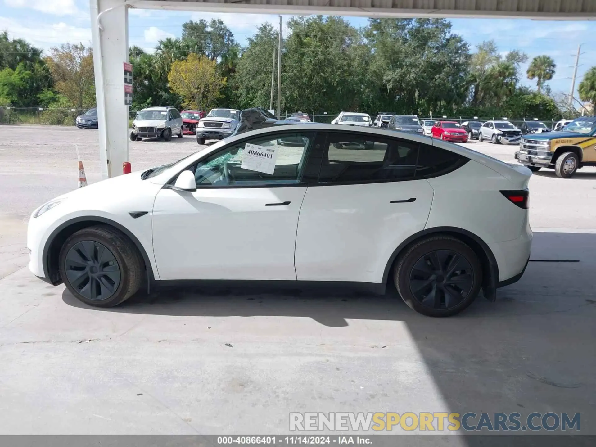 14 Photograph of a damaged car 7SAYGAEE0RF100657 TESLA MODEL Y 2024