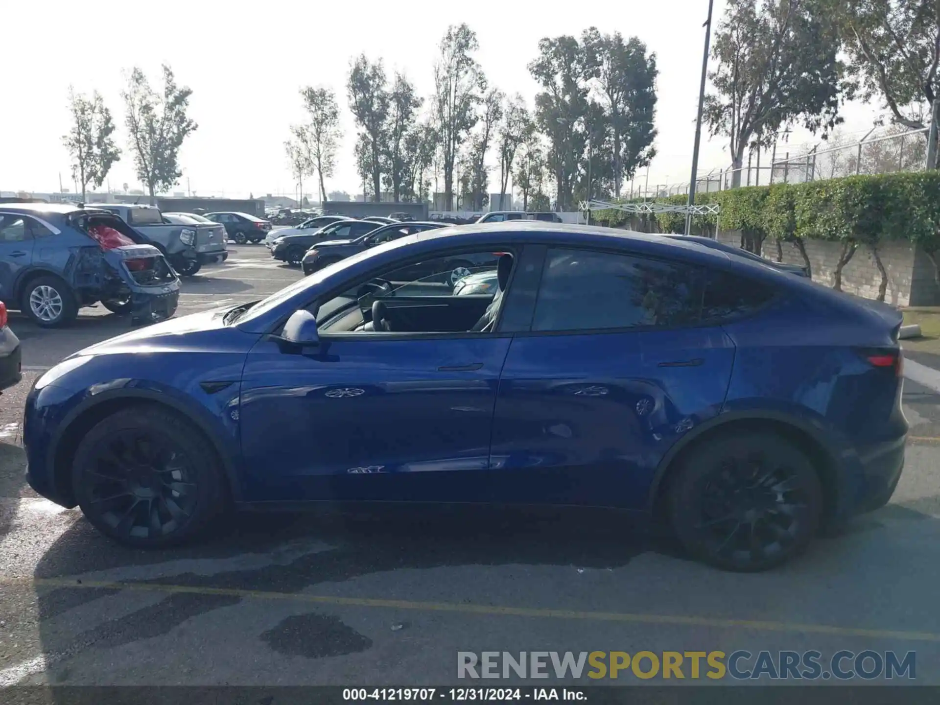 14 Photograph of a damaged car 7SAYGAEE2RF169768 TESLA MODEL Y 2024