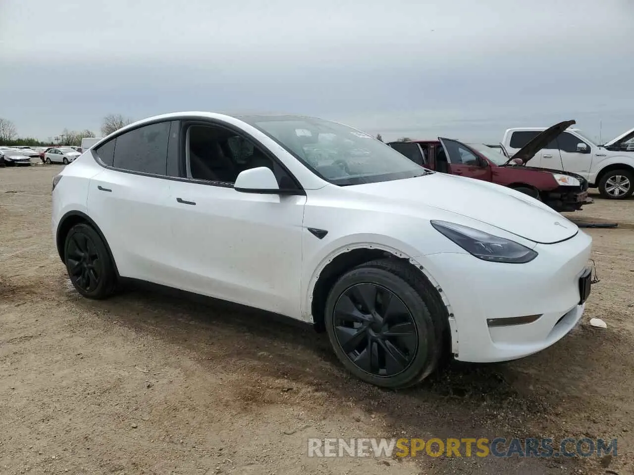 4 Photograph of a damaged car 7SAYGAEE2RF207192 TESLA MODEL Y 2024