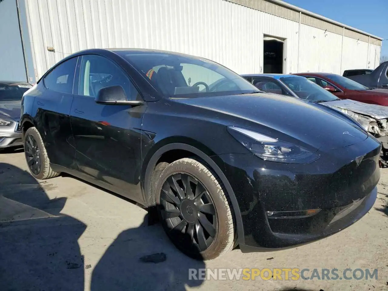 4 Photograph of a damaged car 7SAYGAEE3RF004232 TESLA MODEL Y 2024