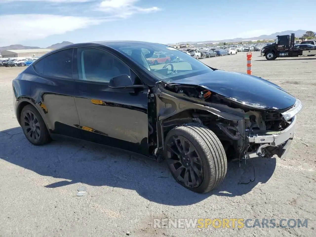 4 Photograph of a damaged car 7SAYGAEE3RF089122 TESLA MODEL Y 2024