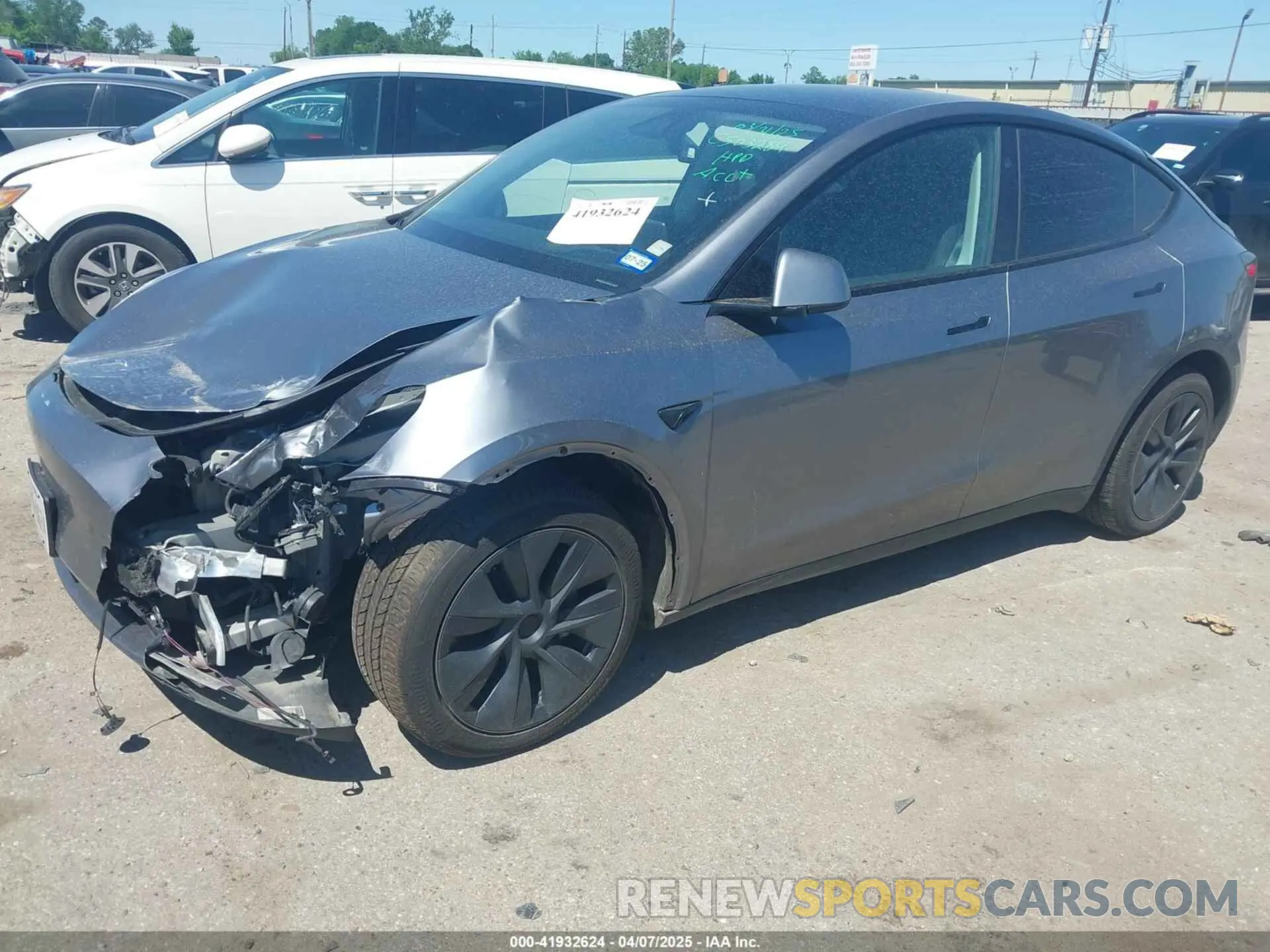2 Photograph of a damaged car 7SAYGAEE3RF153644 TESLA MODEL Y 2024