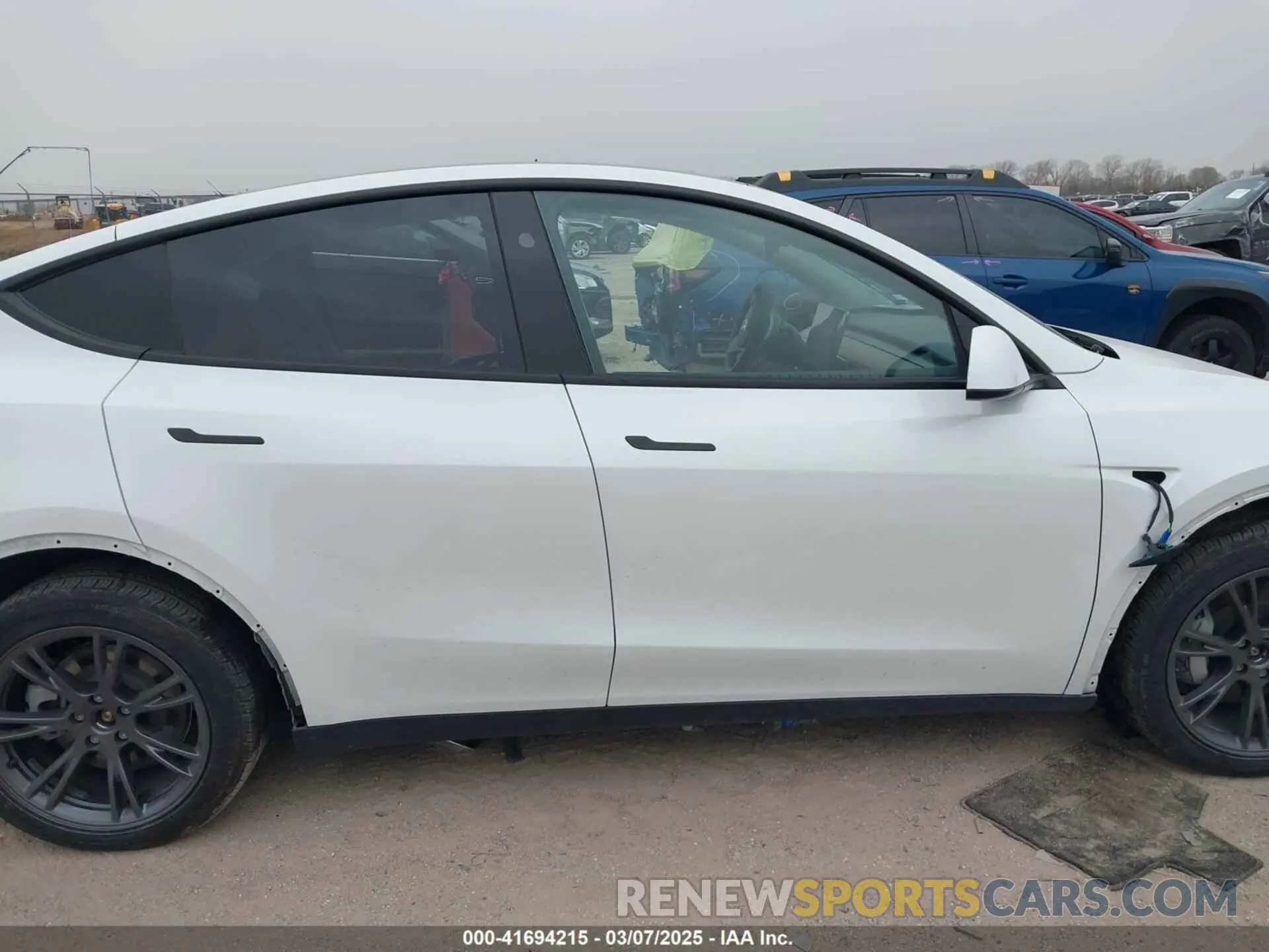 12 Photograph of a damaged car 7SAYGAEE6RF171037 TESLA MODEL Y 2024
