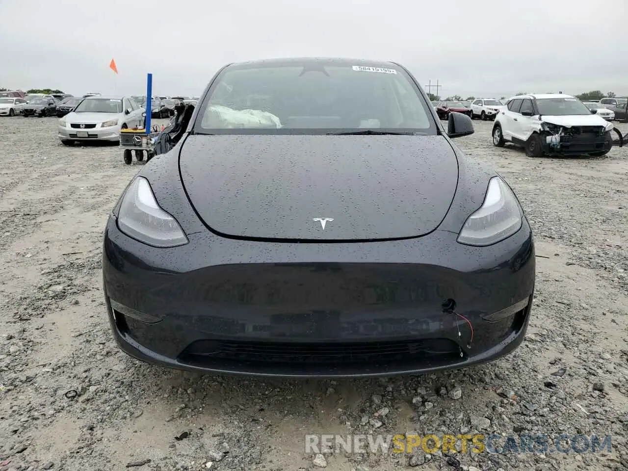 5 Photograph of a damaged car 7SAYGAEE7RF005786 TESLA MODEL Y 2024