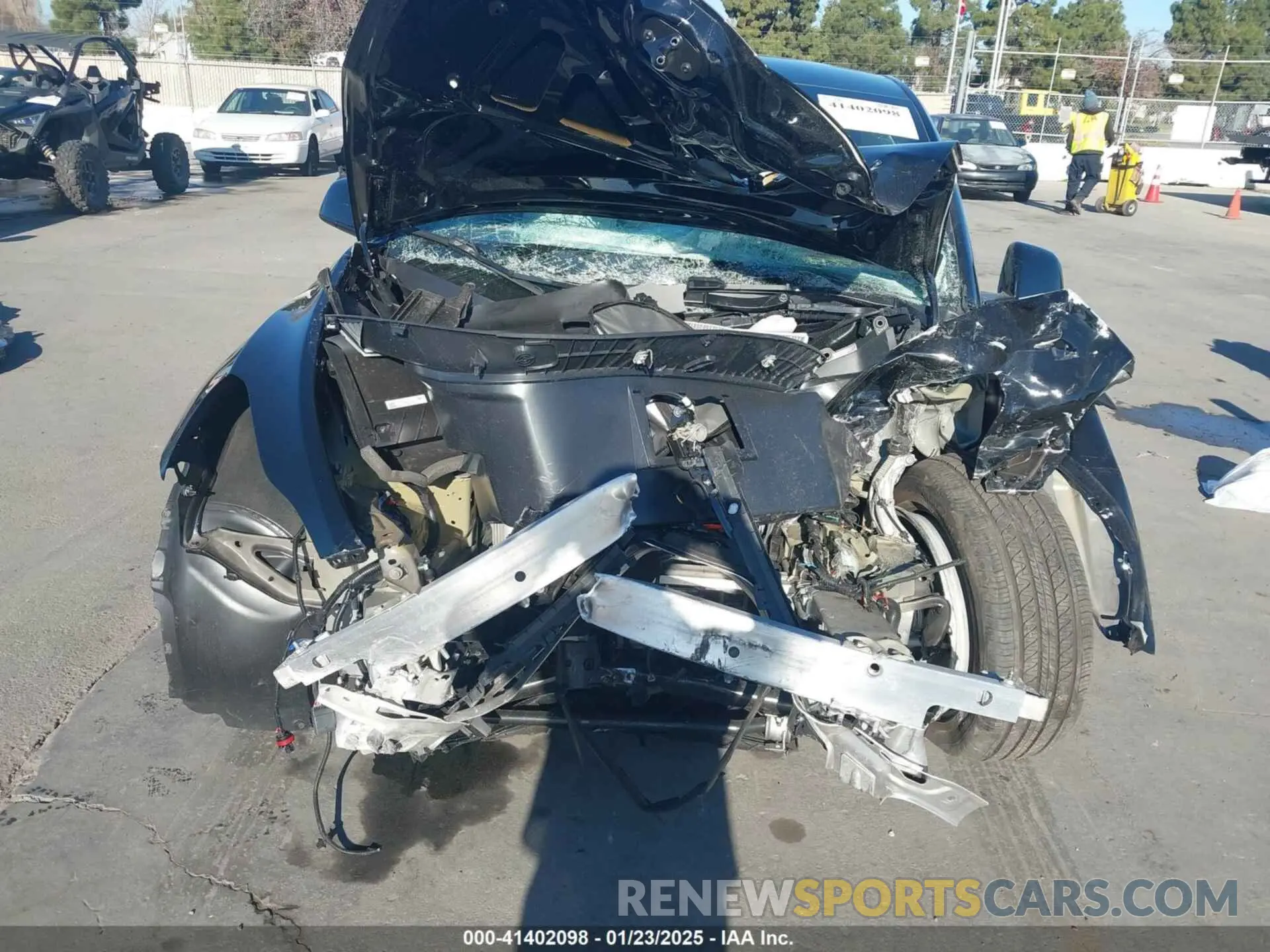 6 Photograph of a damaged car 7SAYGAEE7RF014424 TESLA MODEL Y 2024