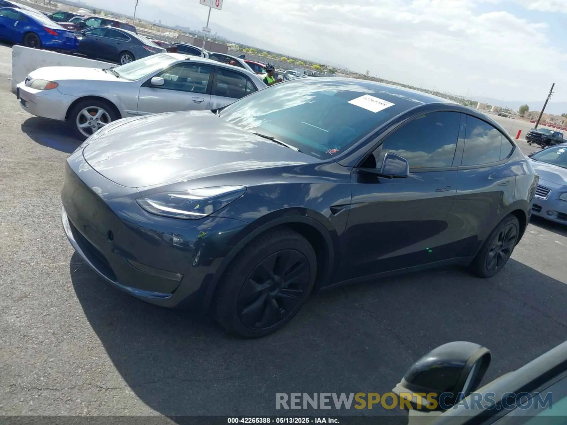 13 Photograph of a damaged car 7SAYGAEE7RF119884 TESLA MODEL Y 2024
