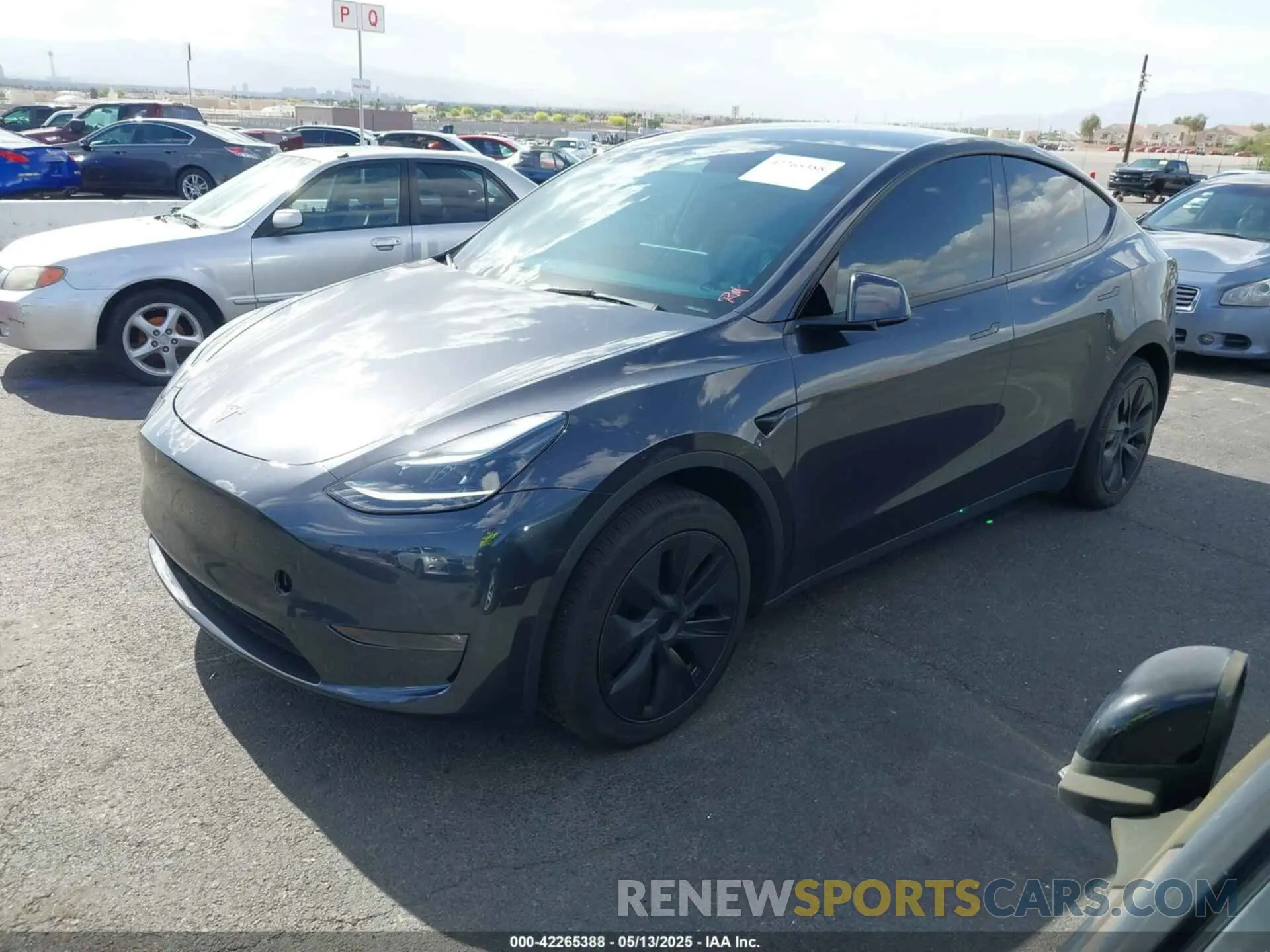 2 Photograph of a damaged car 7SAYGAEE7RF119884 TESLA MODEL Y 2024