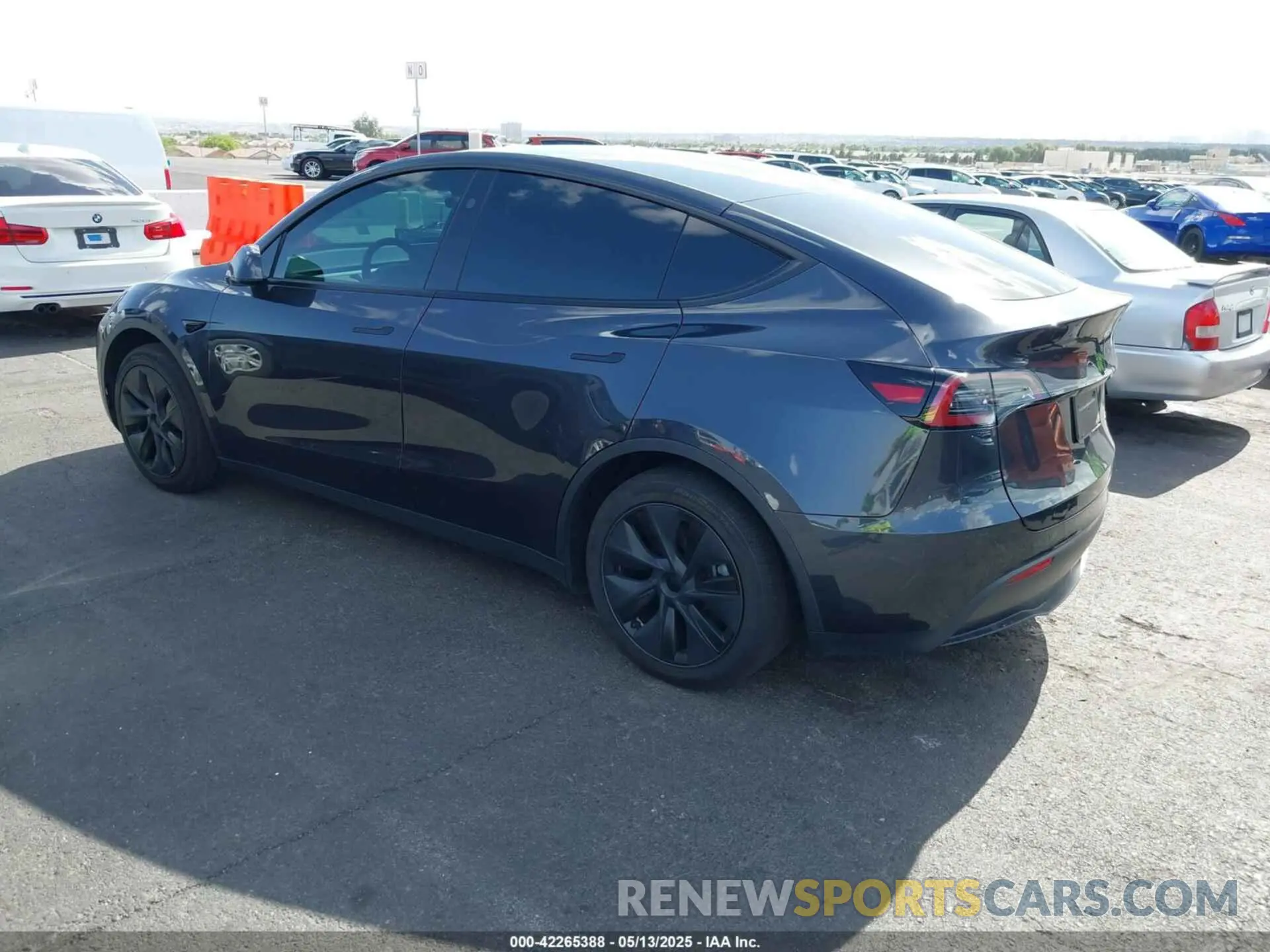 3 Photograph of a damaged car 7SAYGAEE7RF119884 TESLA MODEL Y 2024