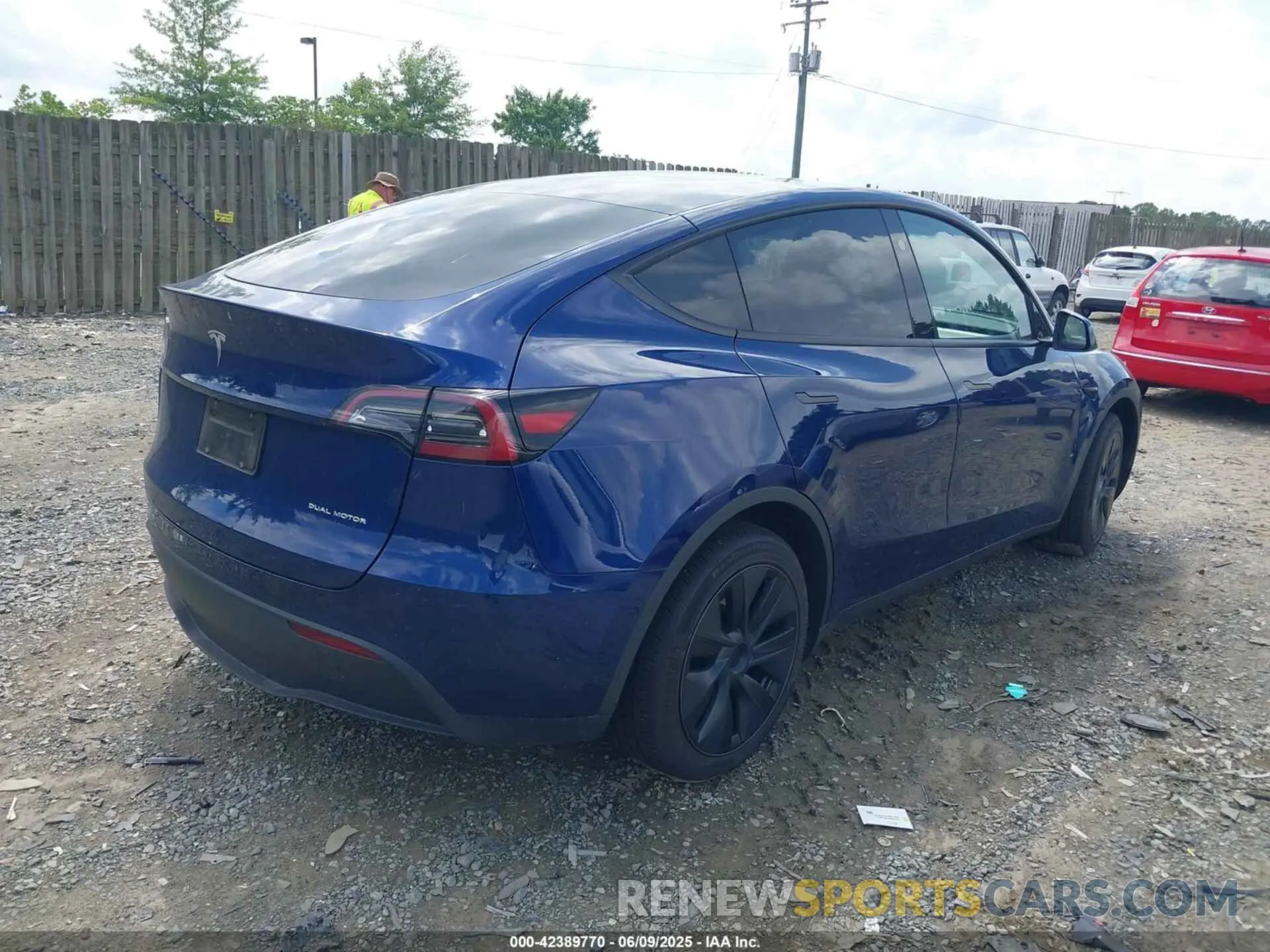 4 Photograph of a damaged car 7SAYGAEE7RF156787 TESLA MODEL Y 2024