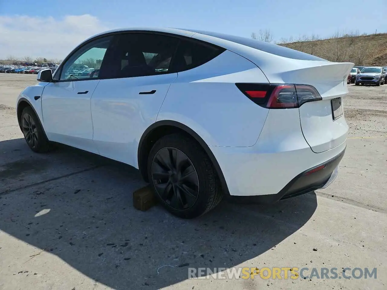 2 Photograph of a damaged car 7SAYGAEE7RF205700 TESLA MODEL Y 2024