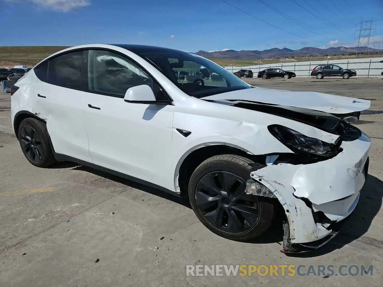 4 Photograph of a damaged car 7SAYGAEE7RF205700 TESLA MODEL Y 2024