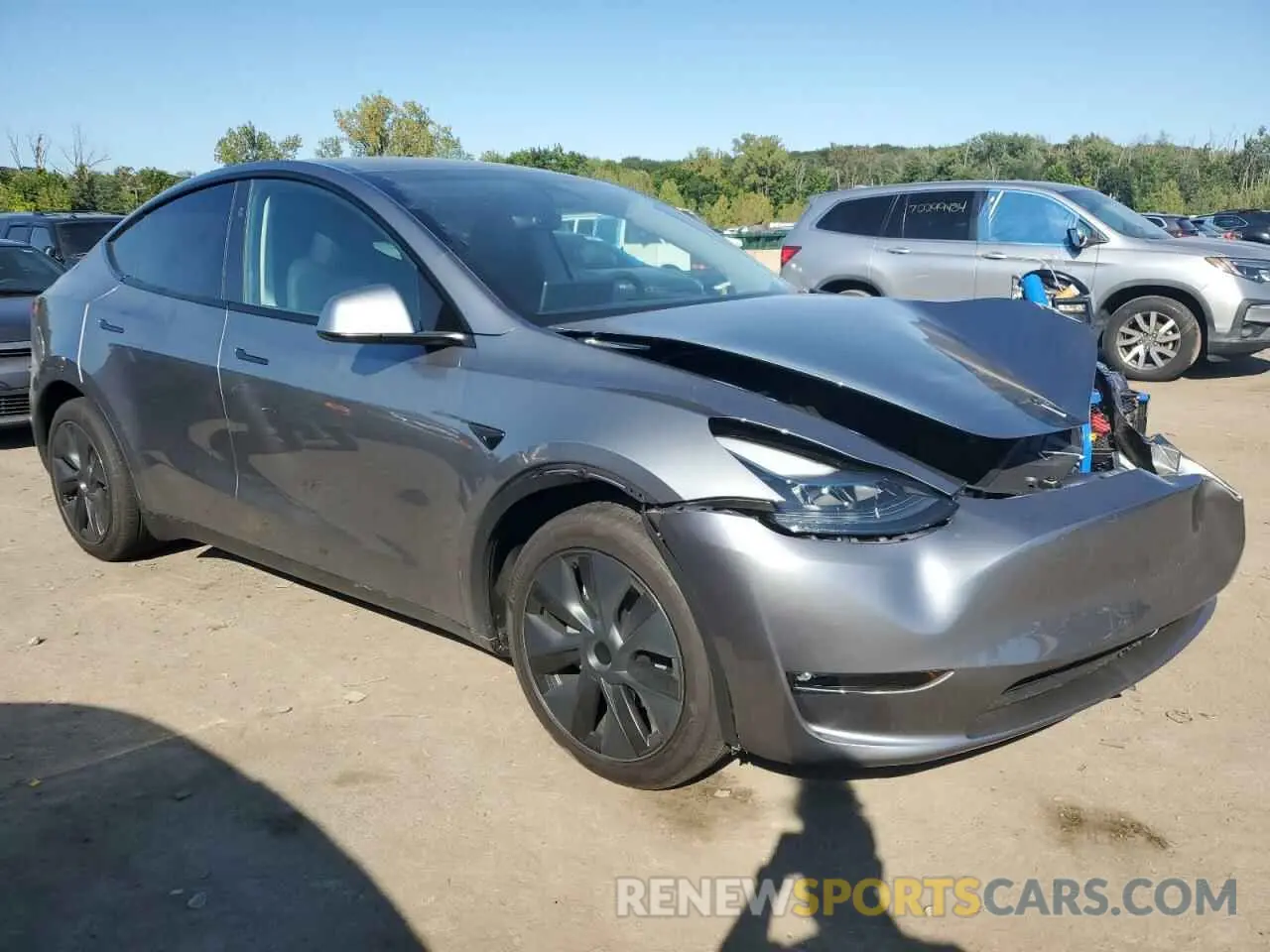 4 Photograph of a damaged car 7SAYGAEE9RF109602 TESLA MODEL Y 2024