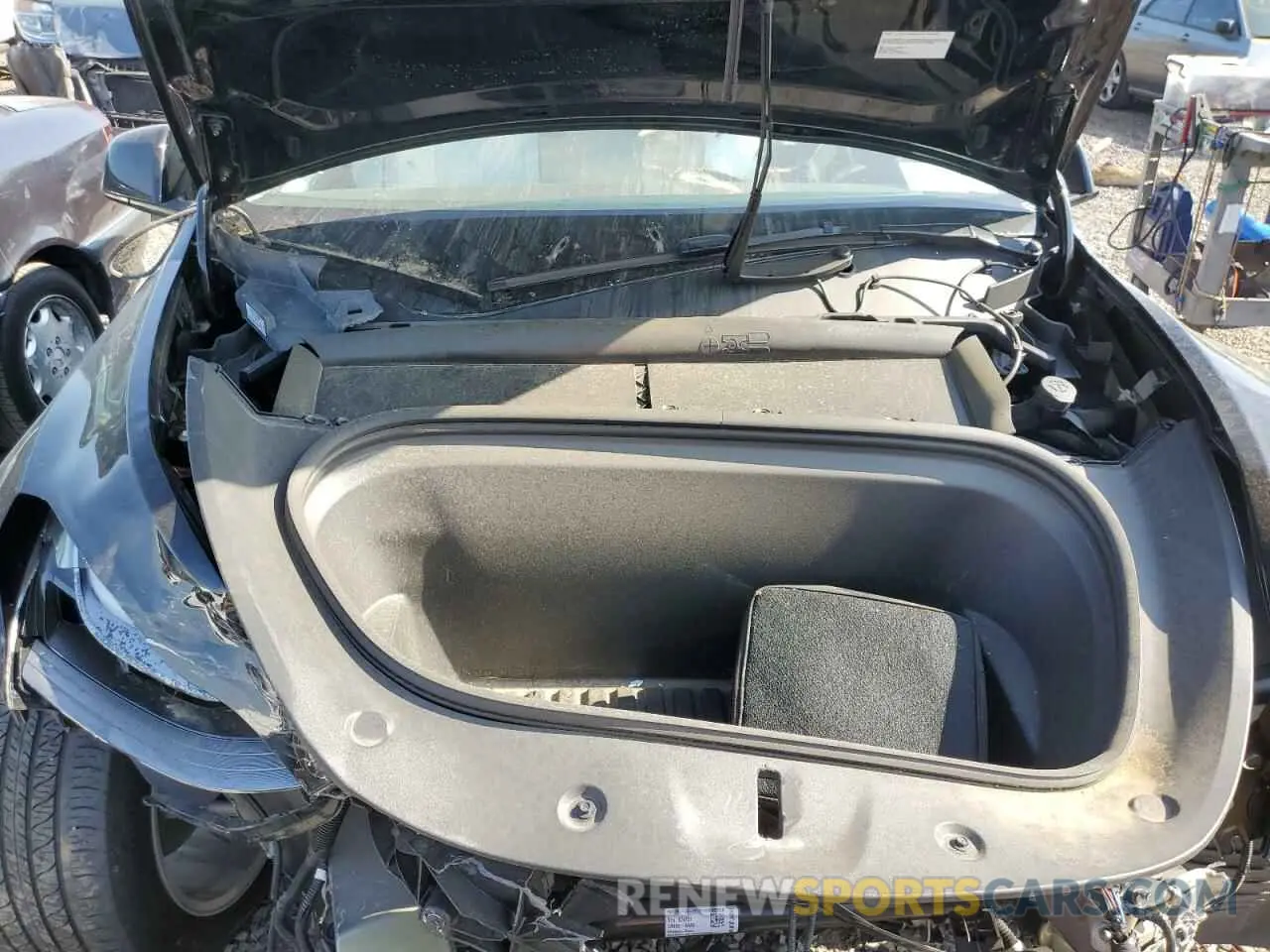 12 Photograph of a damaged car 7SAYGAEEXRF994330 TESLA MODEL Y 2024