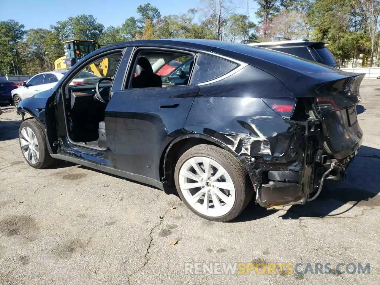 2 Photograph of a damaged car 7SAYGDED0RF004357 TESLA MODEL Y 2024