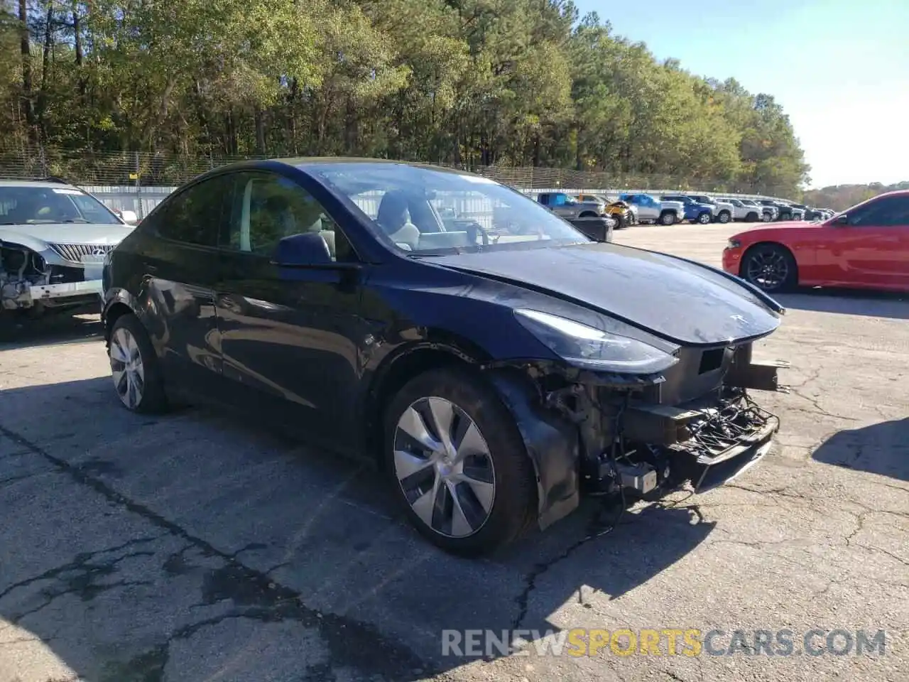 4 Photograph of a damaged car 7SAYGDED0RF004357 TESLA MODEL Y 2024