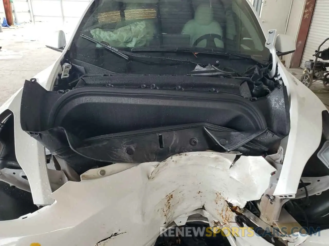 11 Photograph of a damaged car 7SAYGDED0RF034717 TESLA MODEL Y 2024