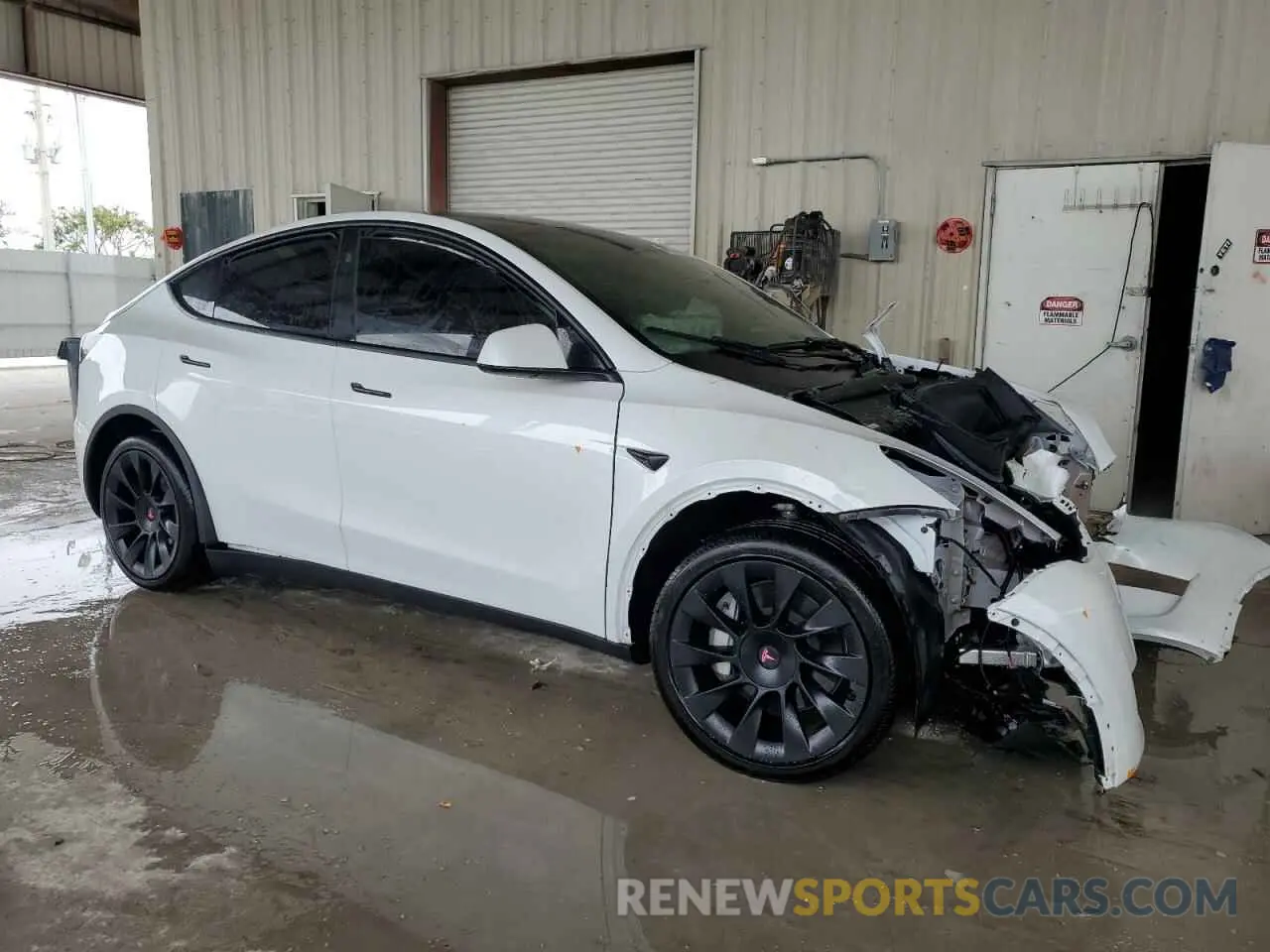 4 Photograph of a damaged car 7SAYGDED0RF034717 TESLA MODEL Y 2024