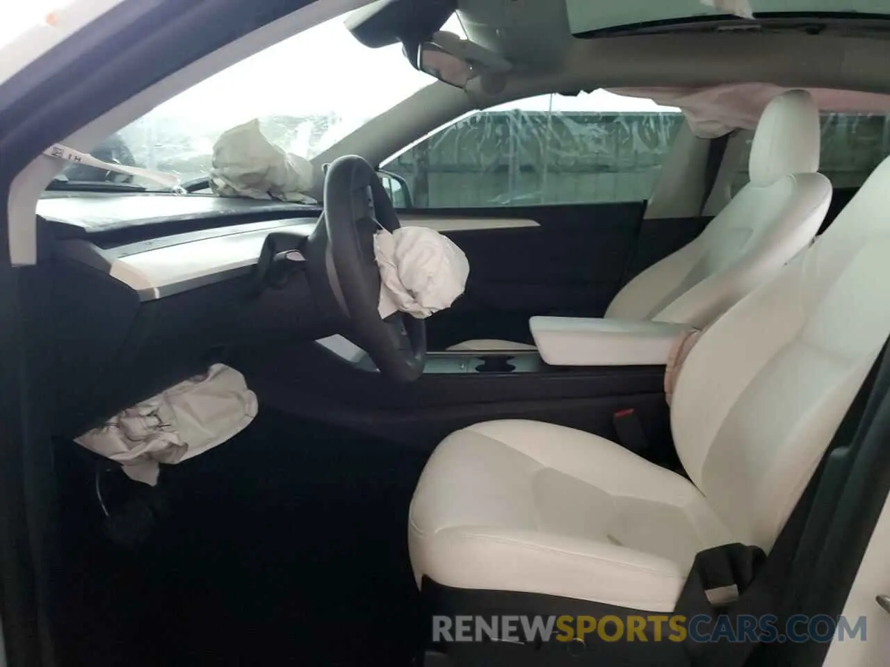 7 Photograph of a damaged car 7SAYGDED0RF034717 TESLA MODEL Y 2024