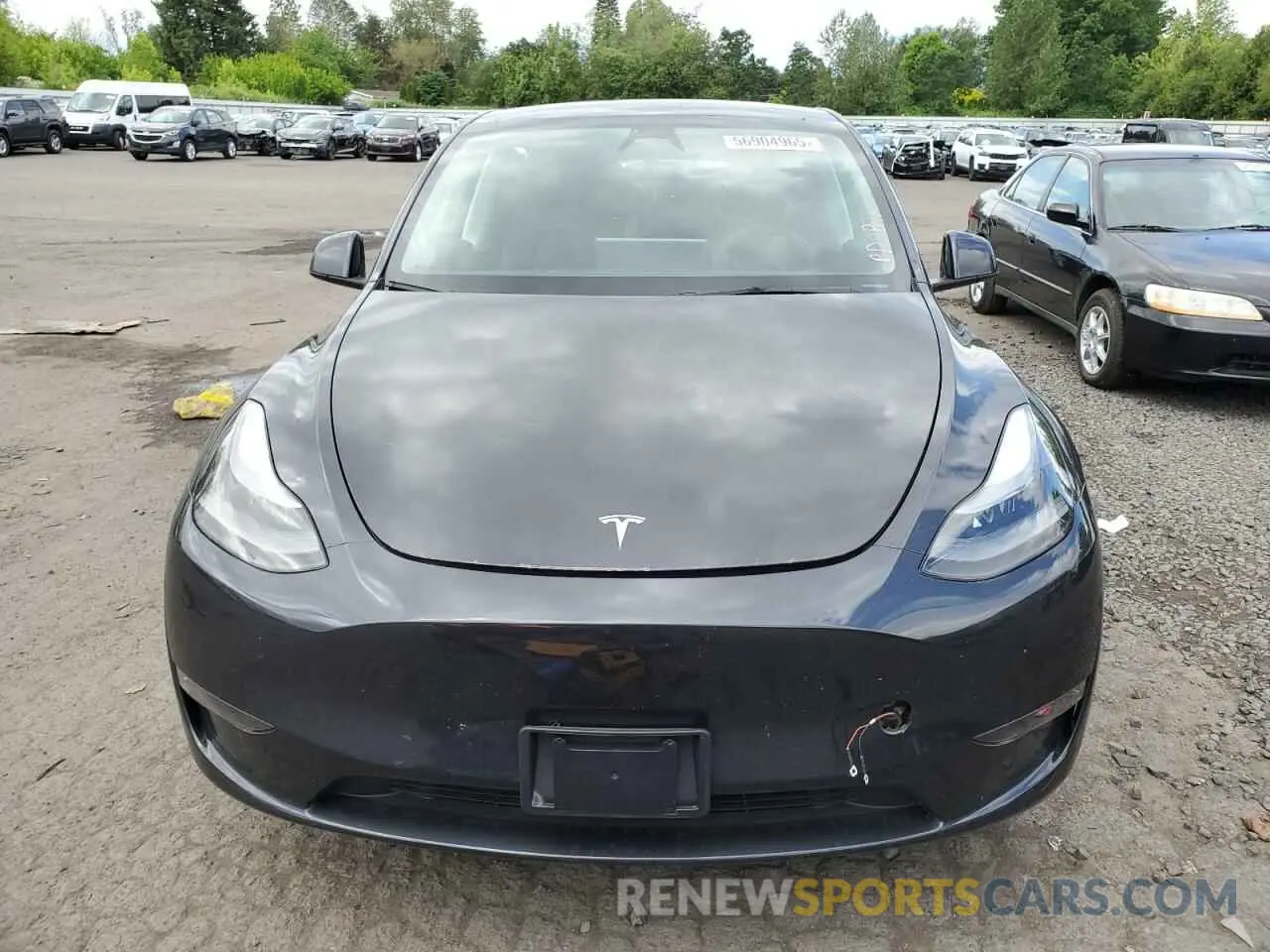 5 Photograph of a damaged car 7SAYGDED0RF043675 TESLA MODEL Y 2024