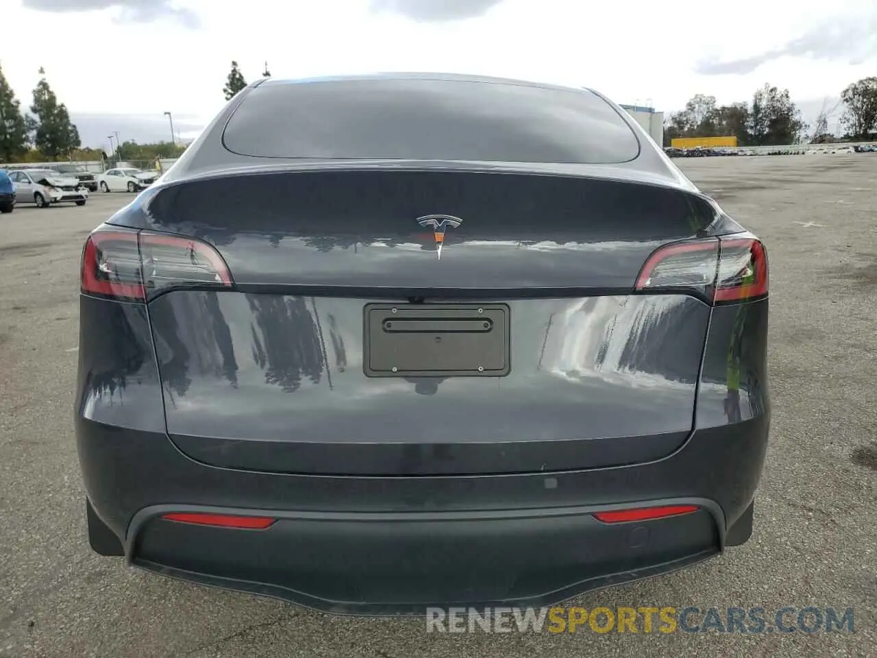 6 Photograph of a damaged car 7SAYGDED0RF111859 TESLA MODEL Y 2024