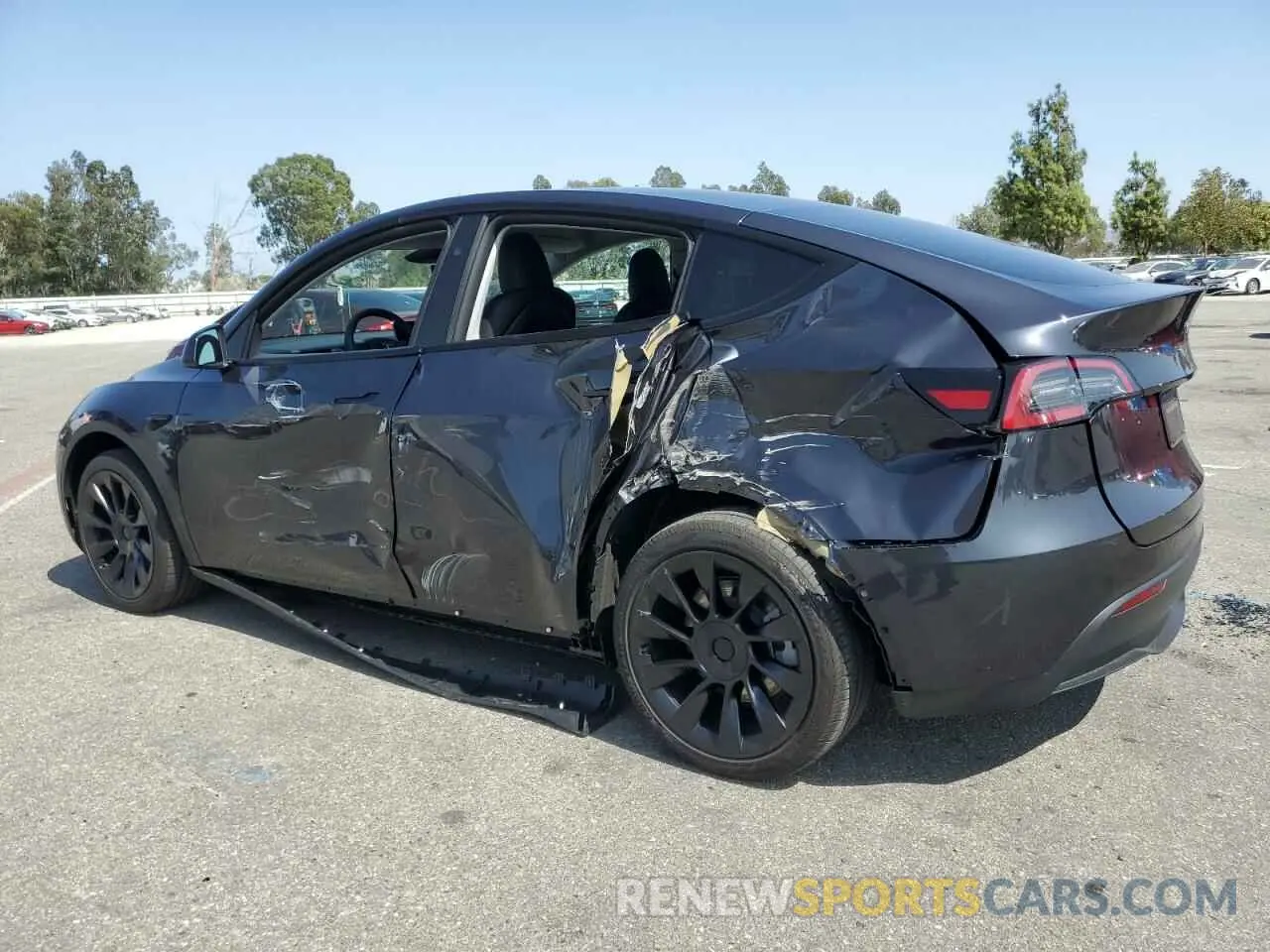 2 Photograph of a damaged car 7SAYGDED0RF119721 TESLA MODEL Y 2024