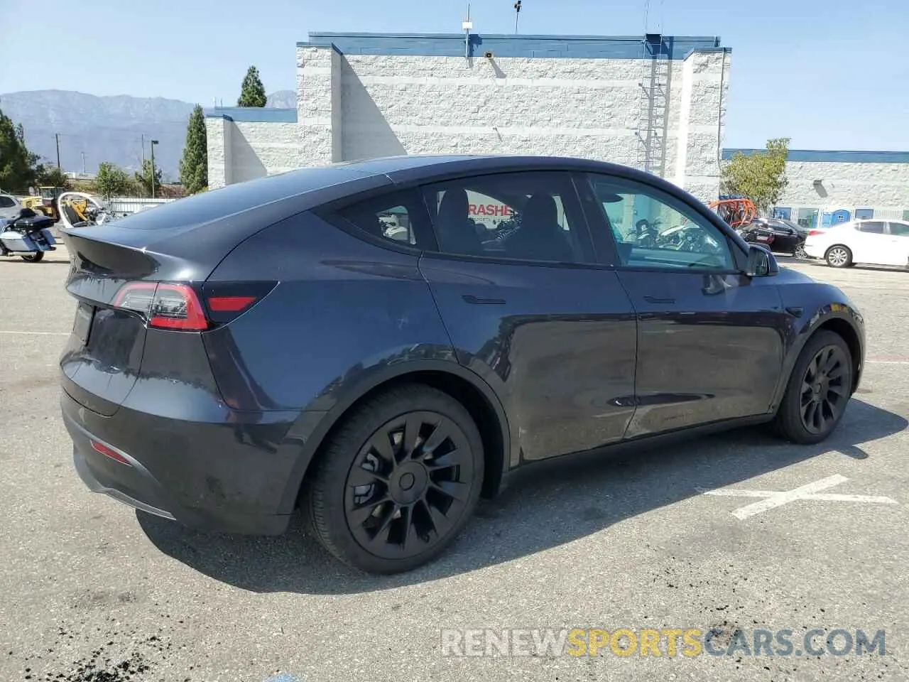 3 Photograph of a damaged car 7SAYGDED0RF119721 TESLA MODEL Y 2024
