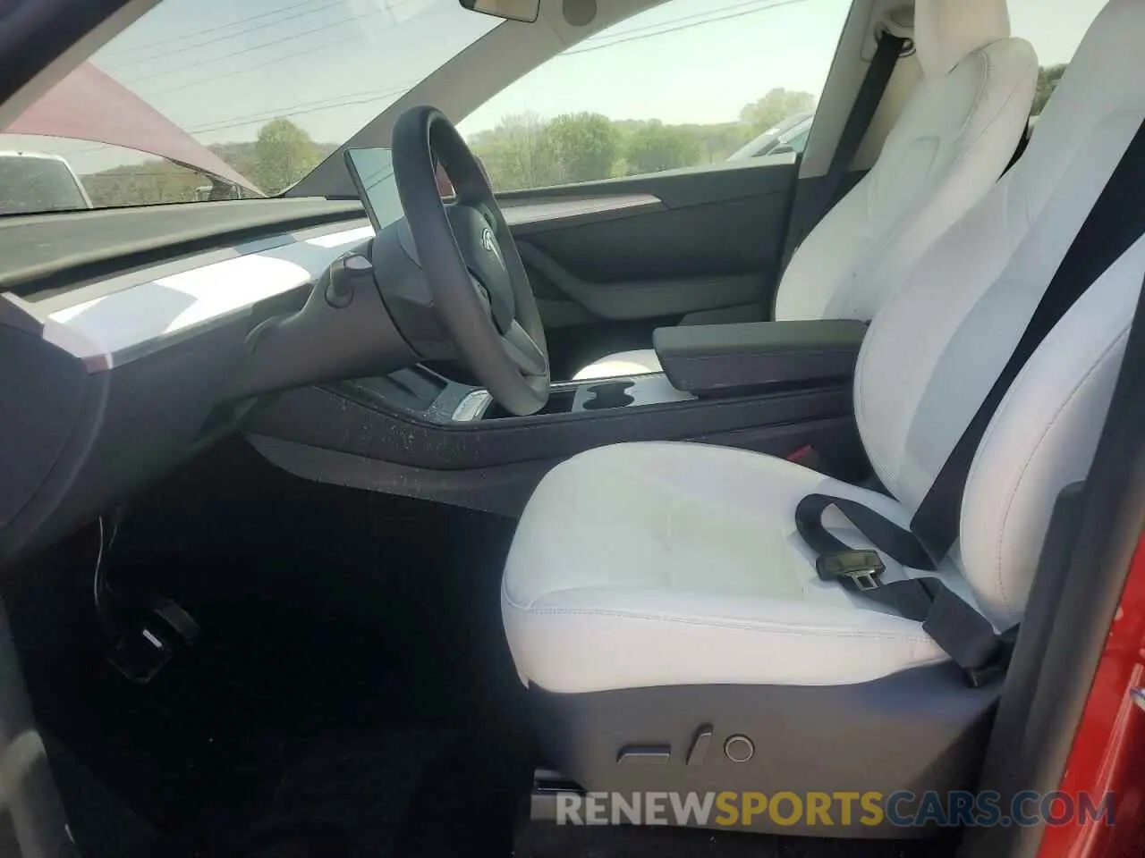 7 Photograph of a damaged car 7SAYGDED0RF191020 TESLA MODEL Y 2024