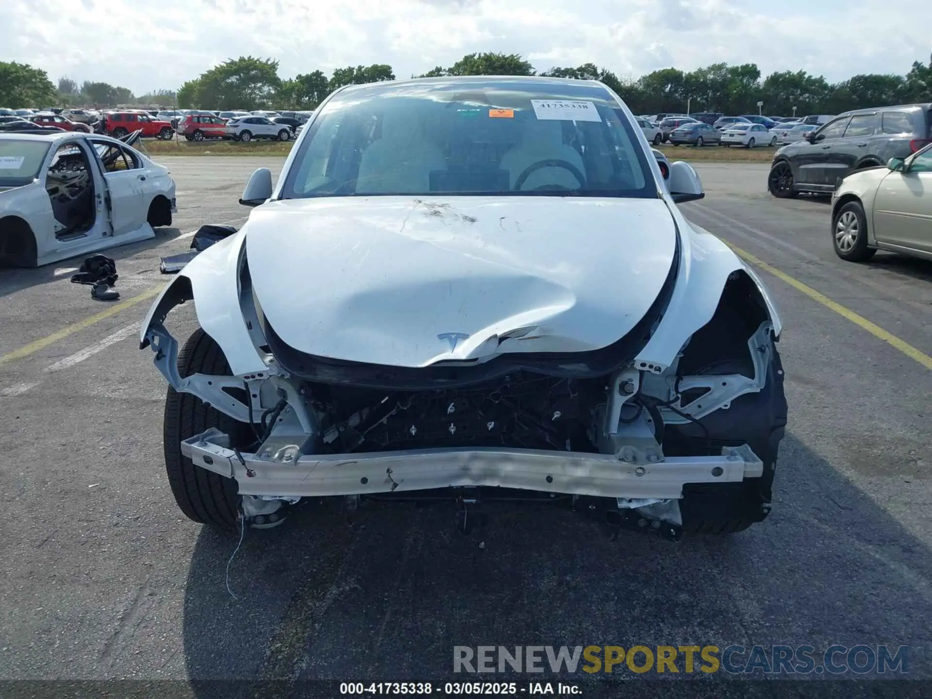 12 Photograph of a damaged car 7SAYGDED0RF199456 TESLA MODEL Y 2024