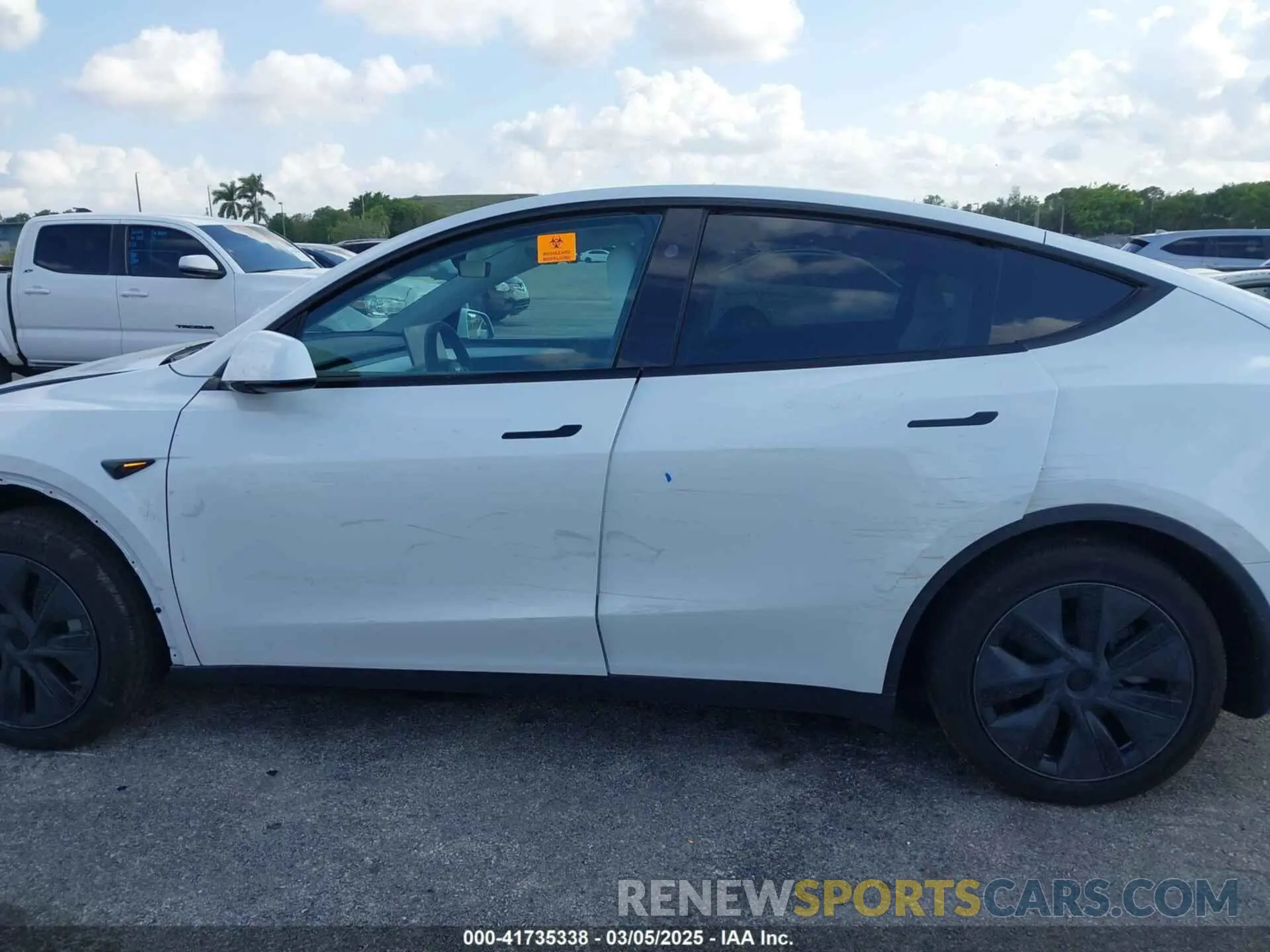 14 Photograph of a damaged car 7SAYGDED0RF199456 TESLA MODEL Y 2024
