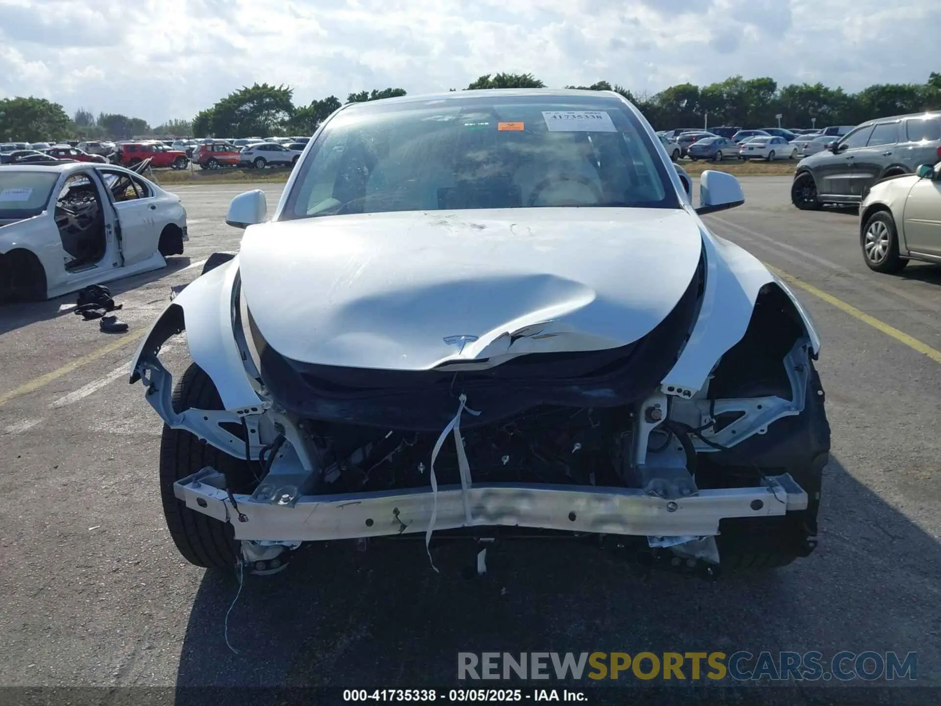 6 Photograph of a damaged car 7SAYGDED0RF199456 TESLA MODEL Y 2024