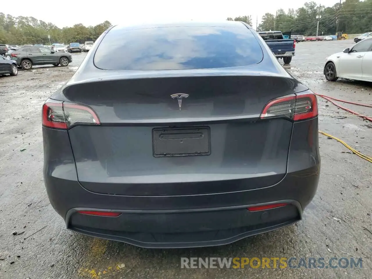 6 Photograph of a damaged car 7SAYGDED1RA303983 TESLA MODEL Y 2024