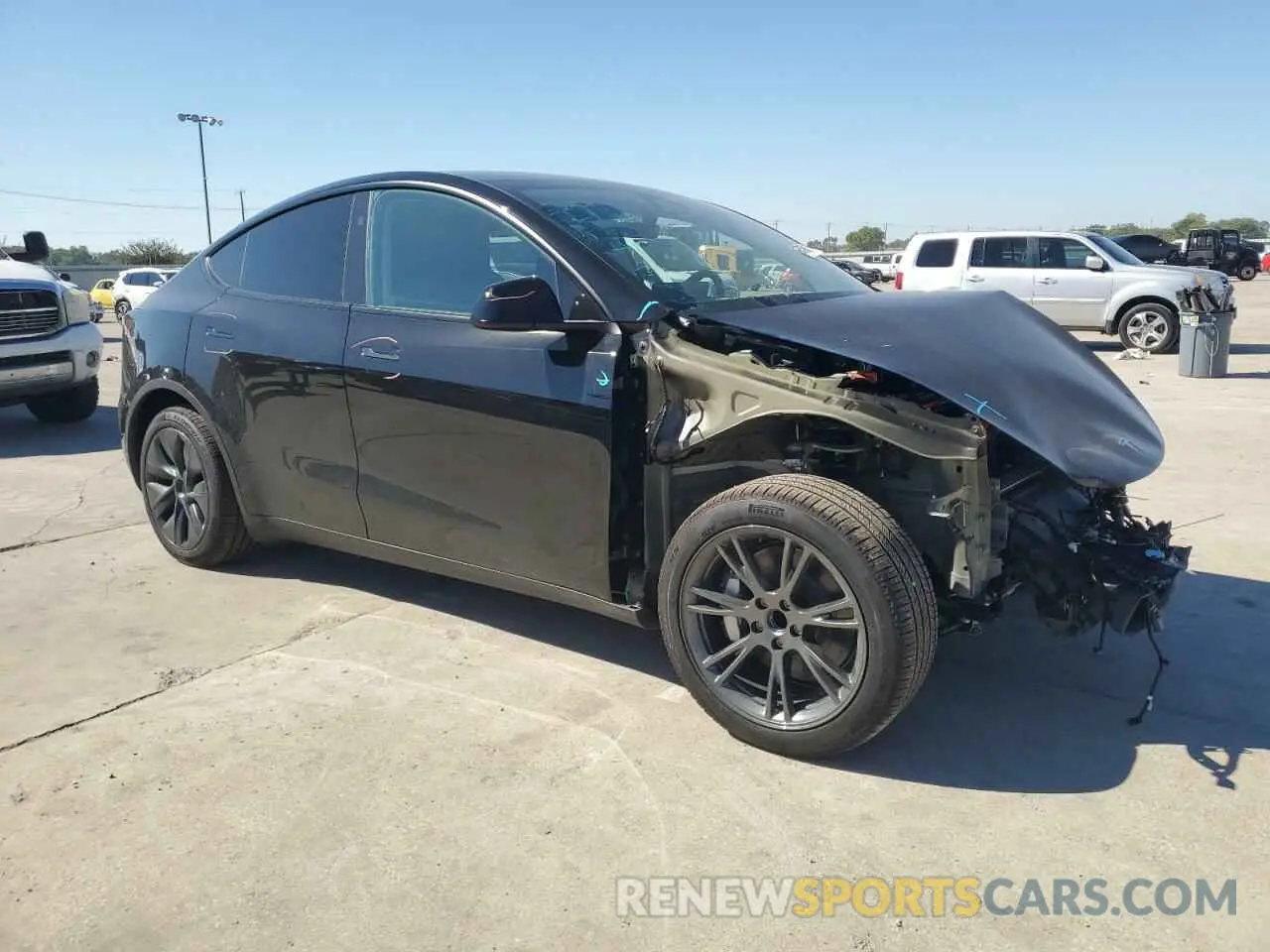 4 Photograph of a damaged car 7SAYGDED1RA305765 TESLA MODEL Y 2024