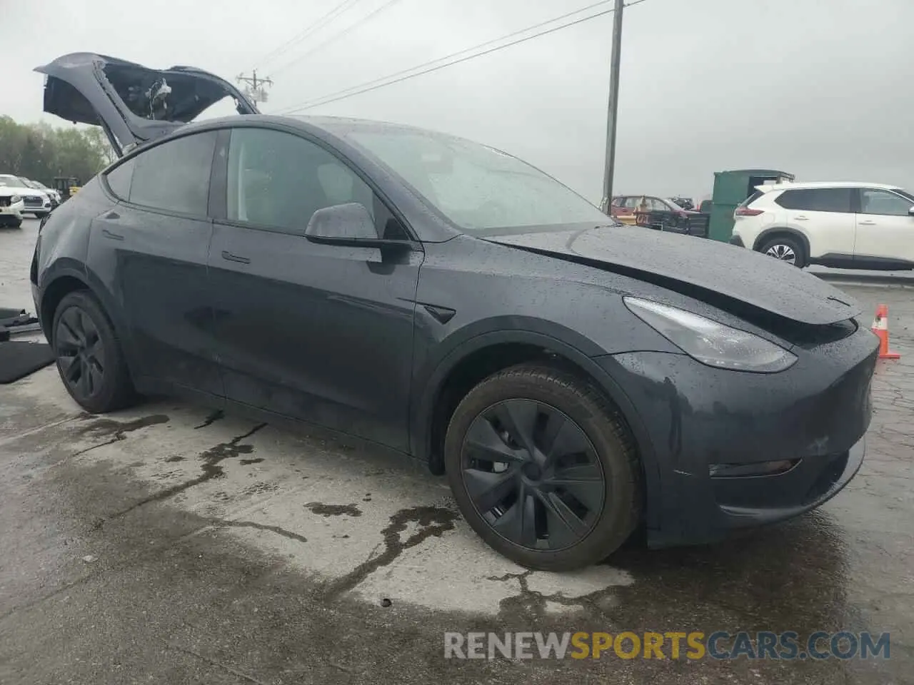 4 Photograph of a damaged car 7SAYGDED1RA321691 TESLA MODEL Y 2024