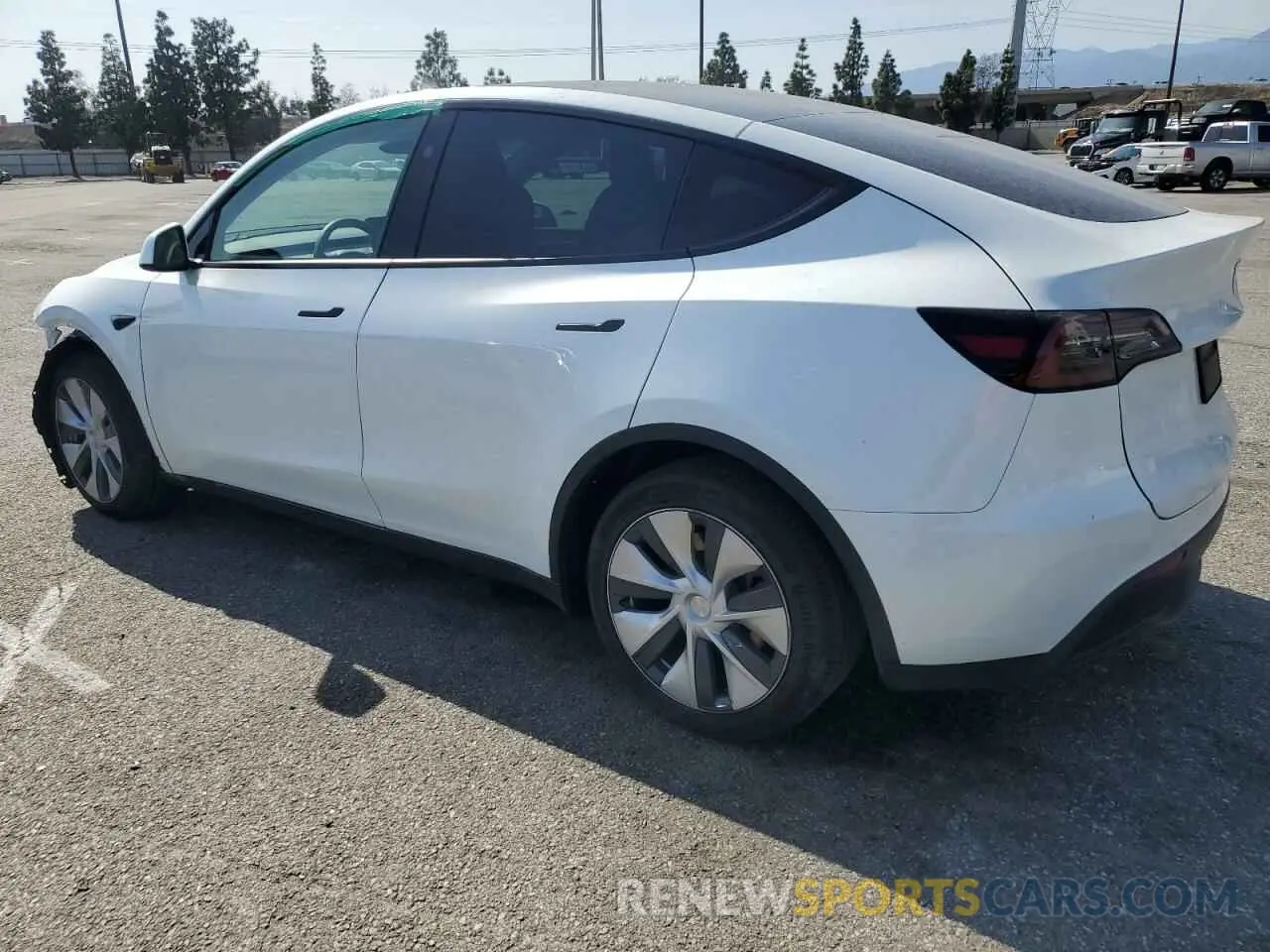2 Photograph of a damaged car 7SAYGDED1RF002570 TESLA MODEL Y 2024