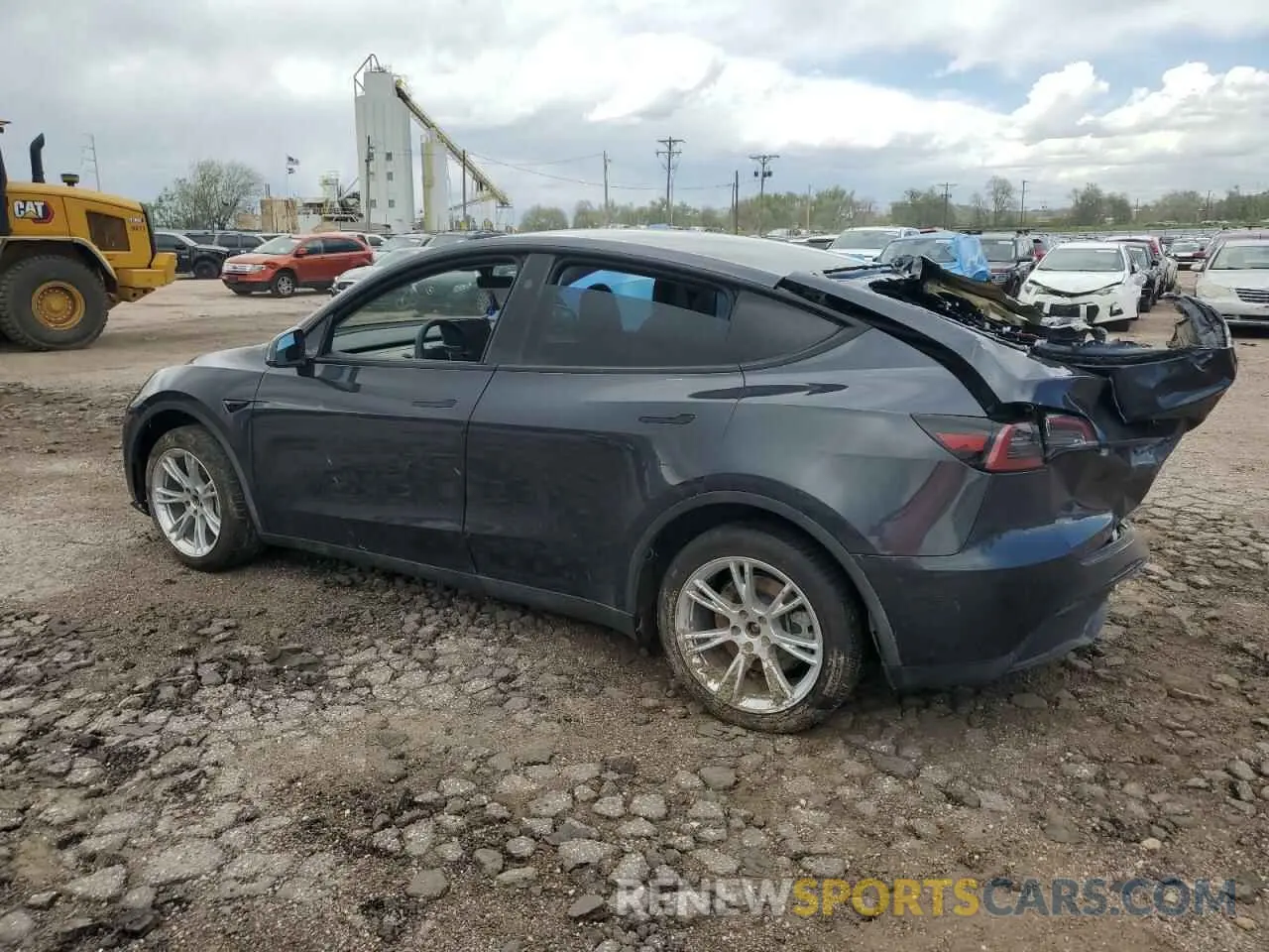 2 Photograph of a damaged car 7SAYGDED1RF005050 TESLA MODEL Y 2024