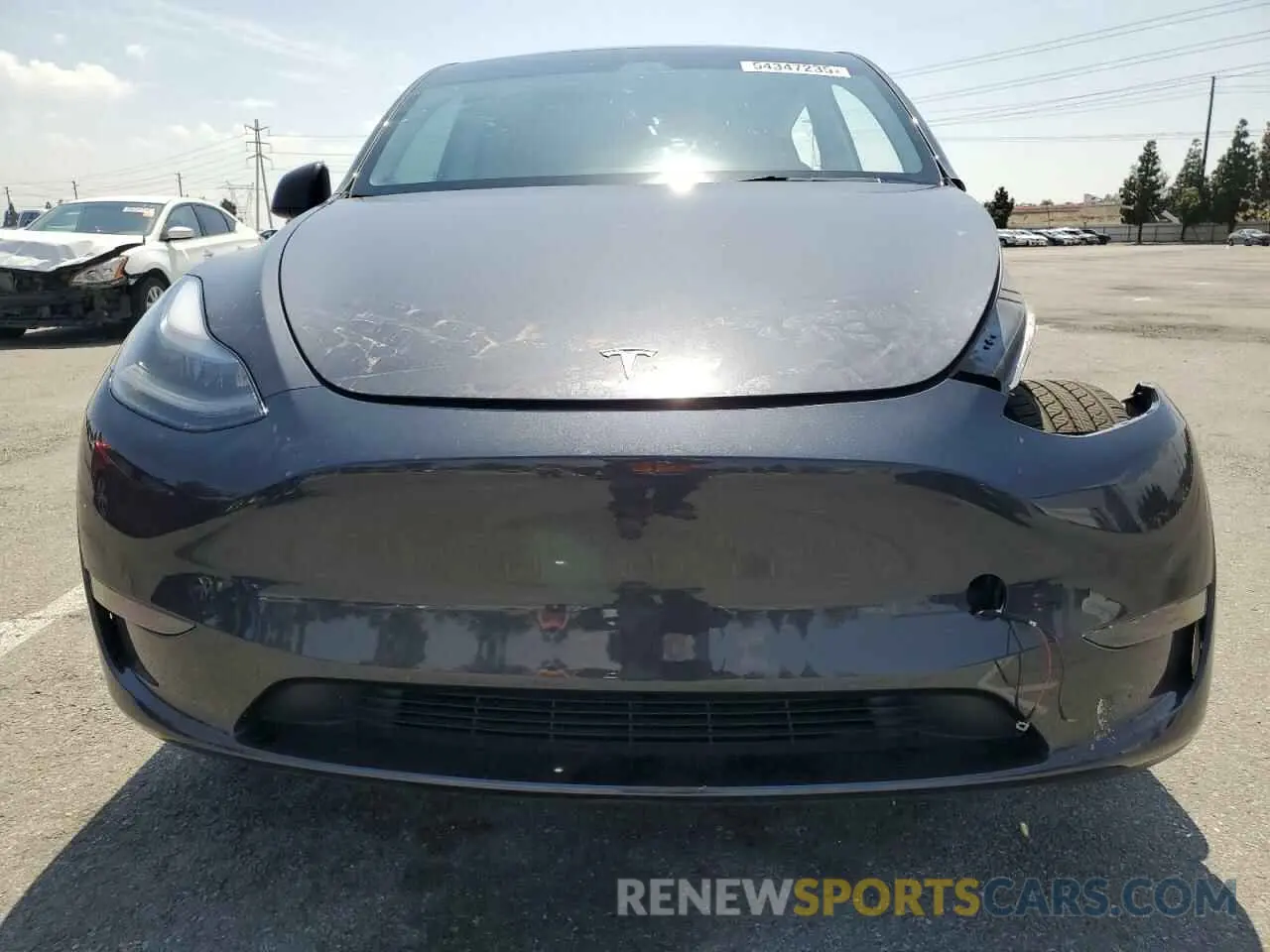 5 Photograph of a damaged car 7SAYGDED1RF046035 TESLA MODEL Y 2024