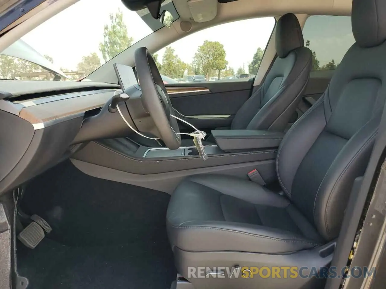 7 Photograph of a damaged car 7SAYGDED1RF046035 TESLA MODEL Y 2024