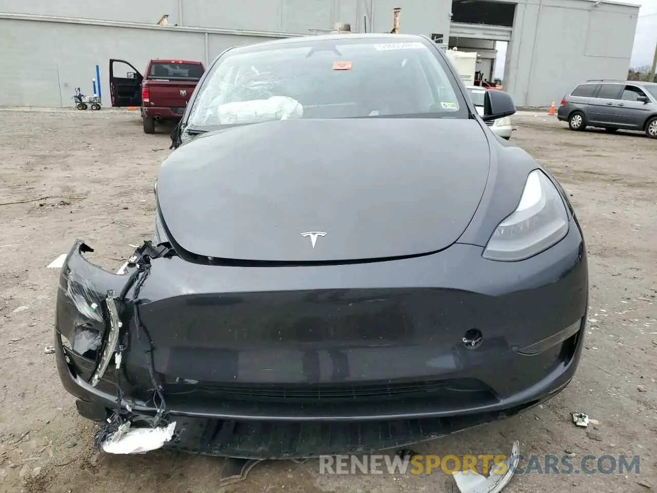 5 Photograph of a damaged car 7SAYGDED1RF092027 TESLA MODEL Y 2024