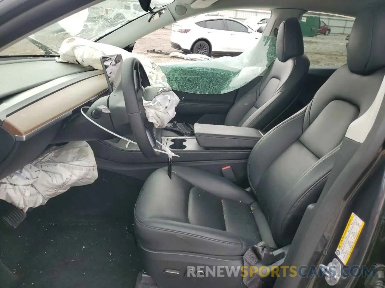 7 Photograph of a damaged car 7SAYGDED1RF092027 TESLA MODEL Y 2024