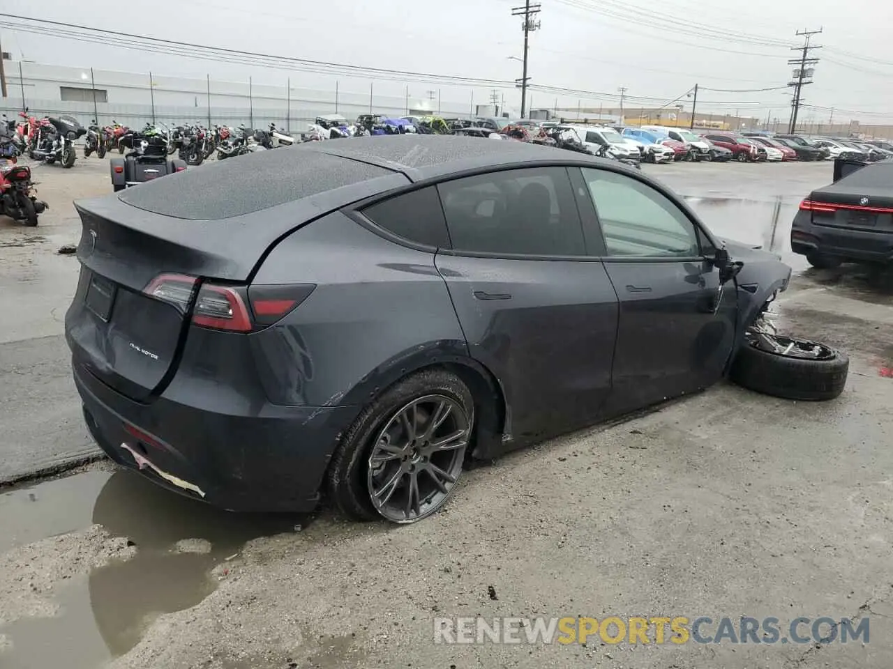 3 Photograph of a damaged car 7SAYGDED1RF098054 TESLA MODEL Y 2024