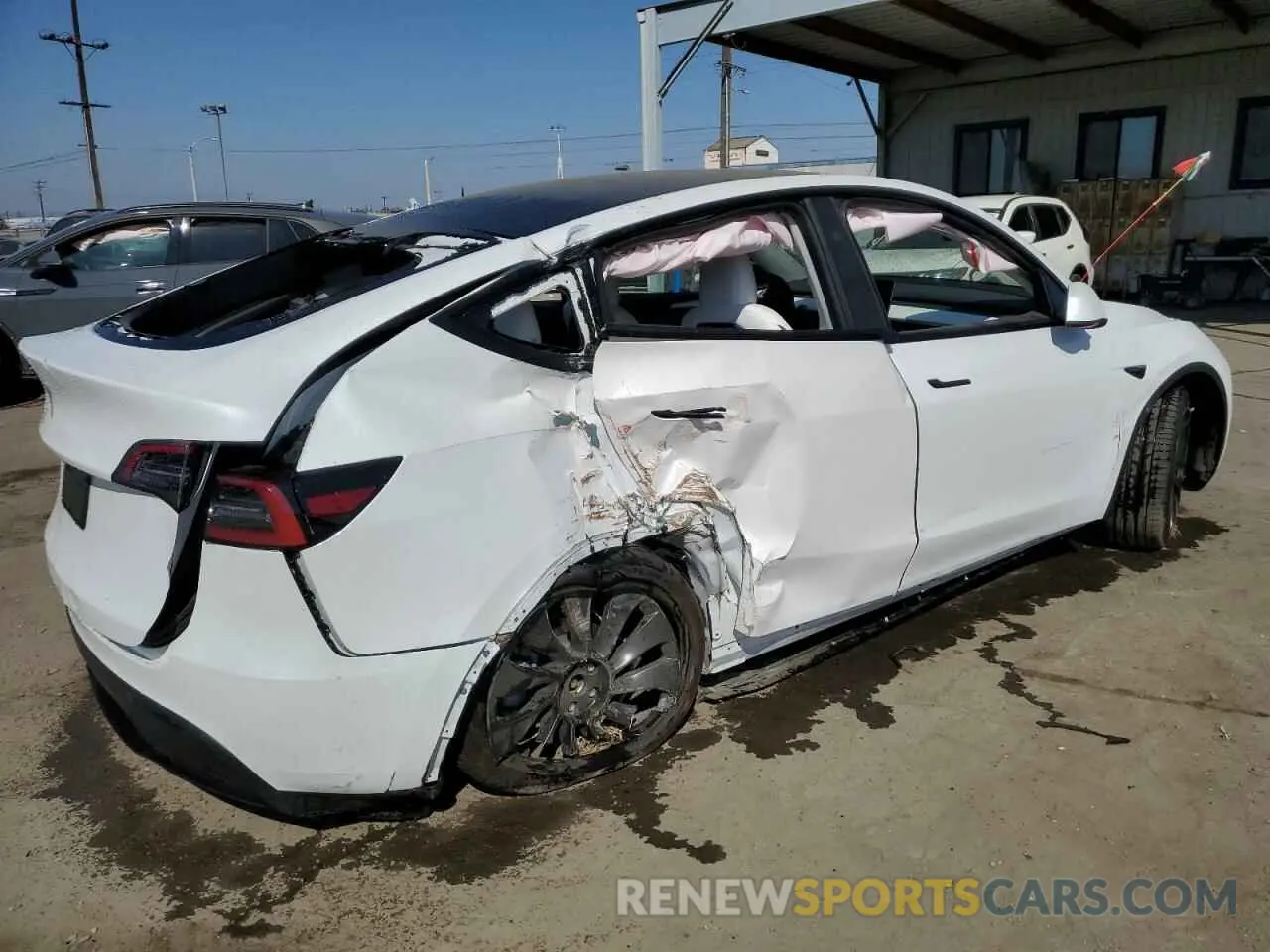 3 Photograph of a damaged car 7SAYGDED1RF104449 TESLA MODEL Y 2024