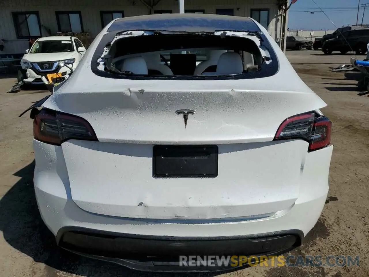 6 Photograph of a damaged car 7SAYGDED1RF104449 TESLA MODEL Y 2024