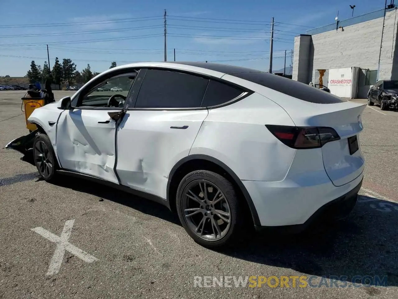 2 Photograph of a damaged car 7SAYGDED1RF115290 TESLA MODEL Y 2024
