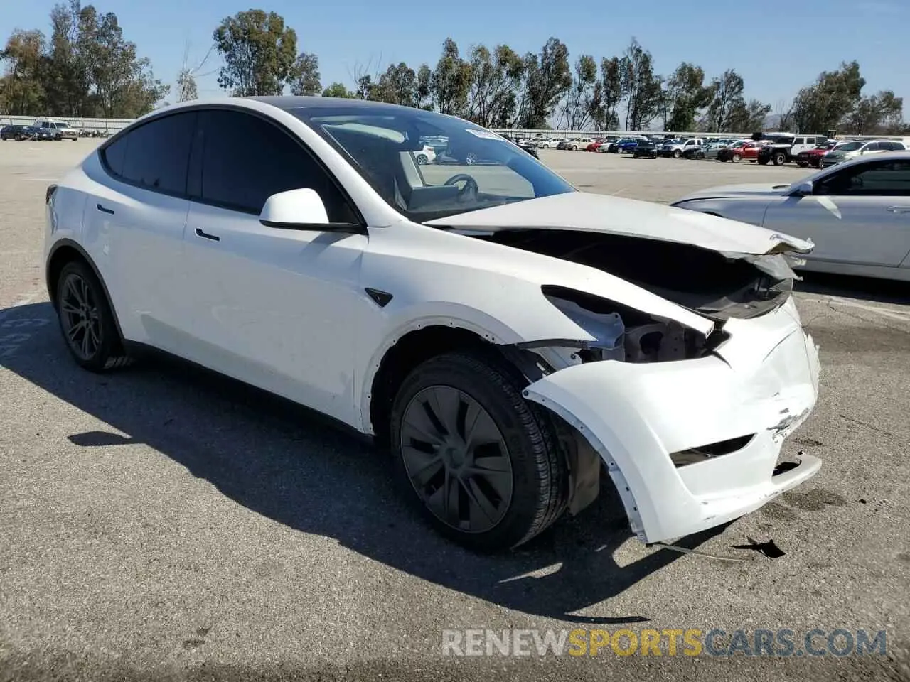 4 Photograph of a damaged car 7SAYGDED1RF115290 TESLA MODEL Y 2024